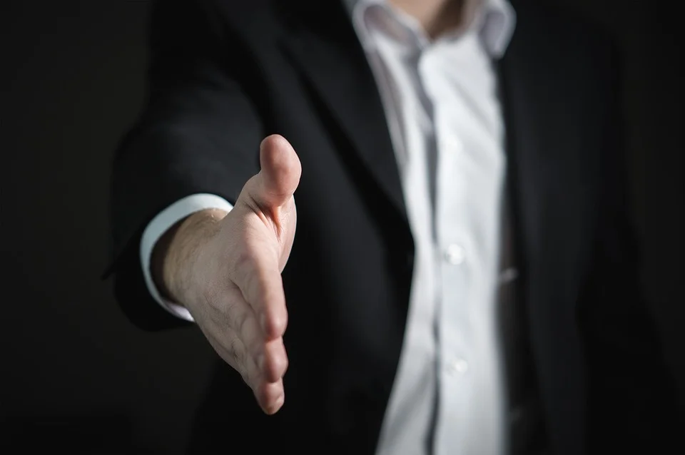 suit_handshake
