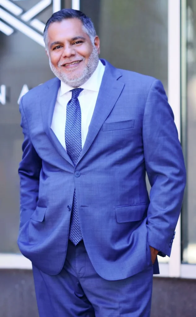 raj nichani standing outside rmn agency